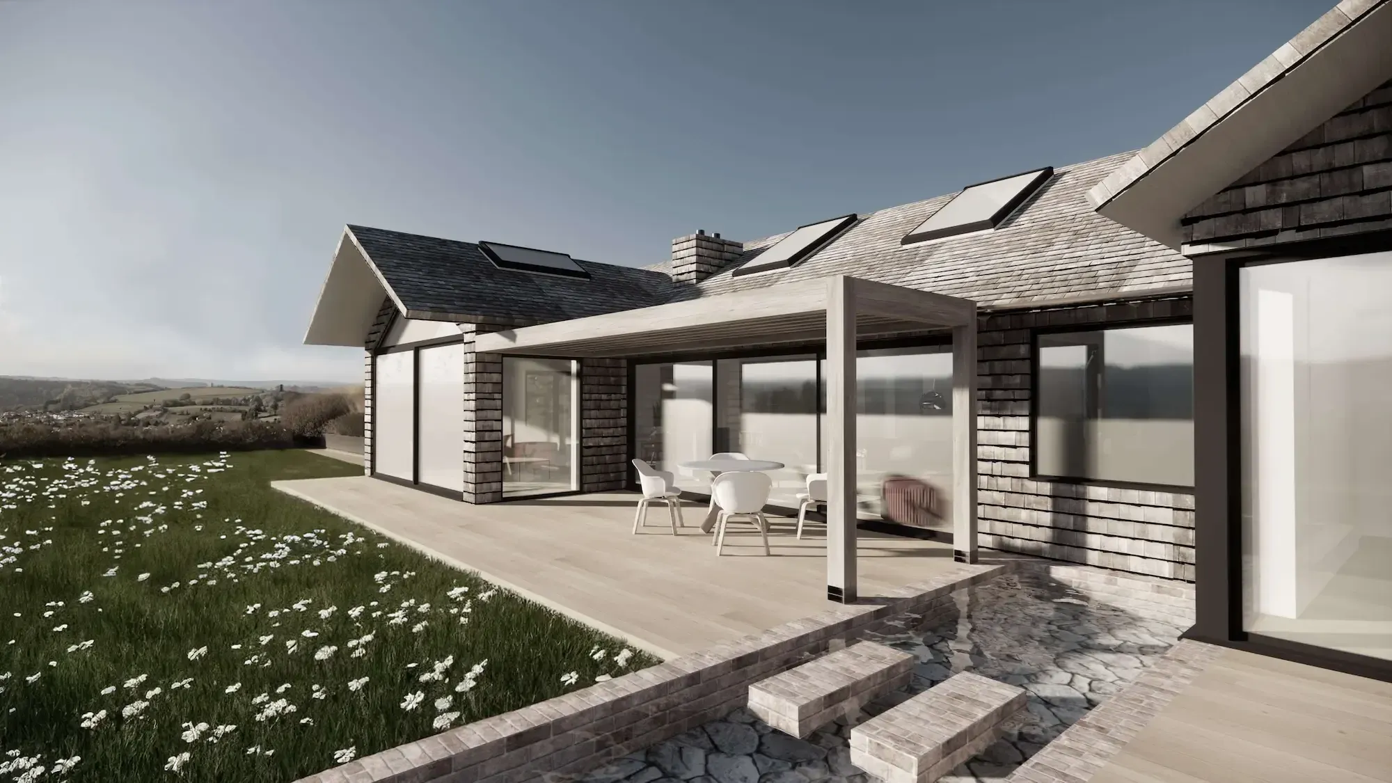A 3D view of a single-storey house with a covered timber terrace and rooflights, looking out over open countryside.