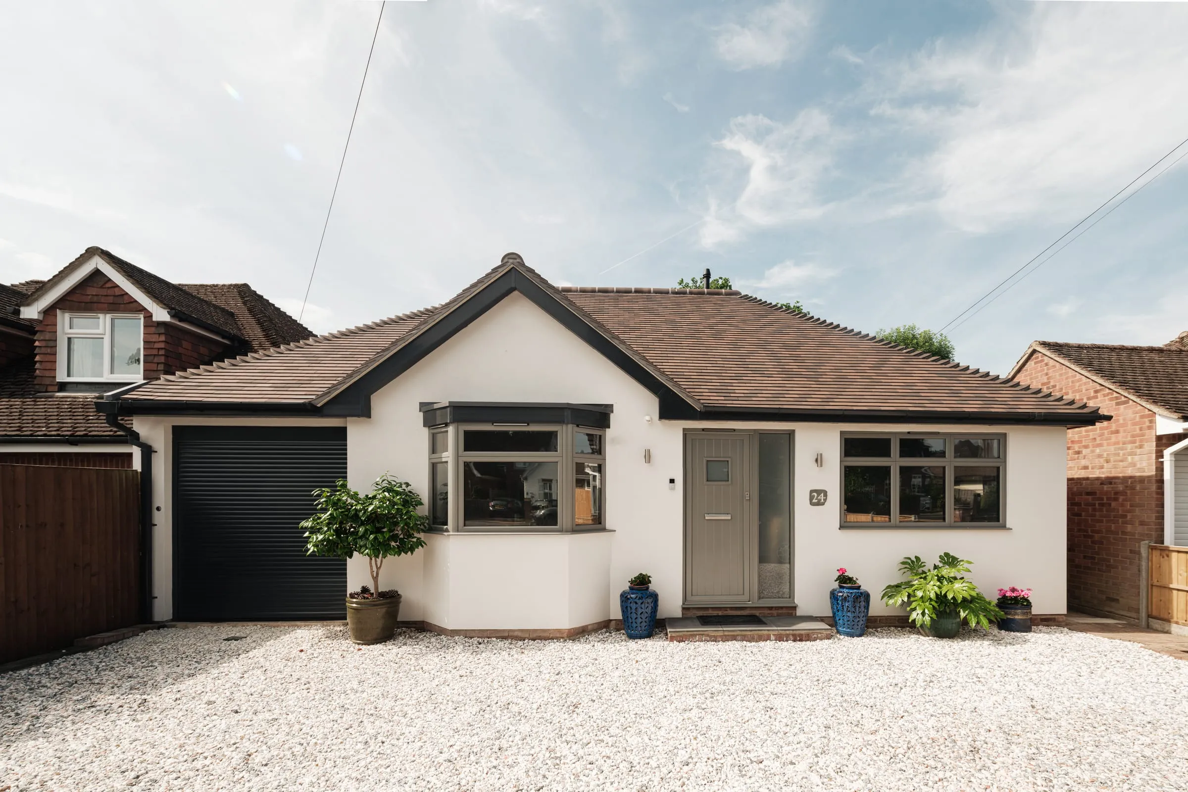 The front of a renovated white rendered bungalow in Reading